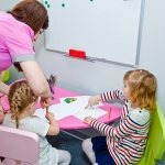 Children work with a speech therapist