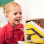 Child at a lesson with a speech therapist